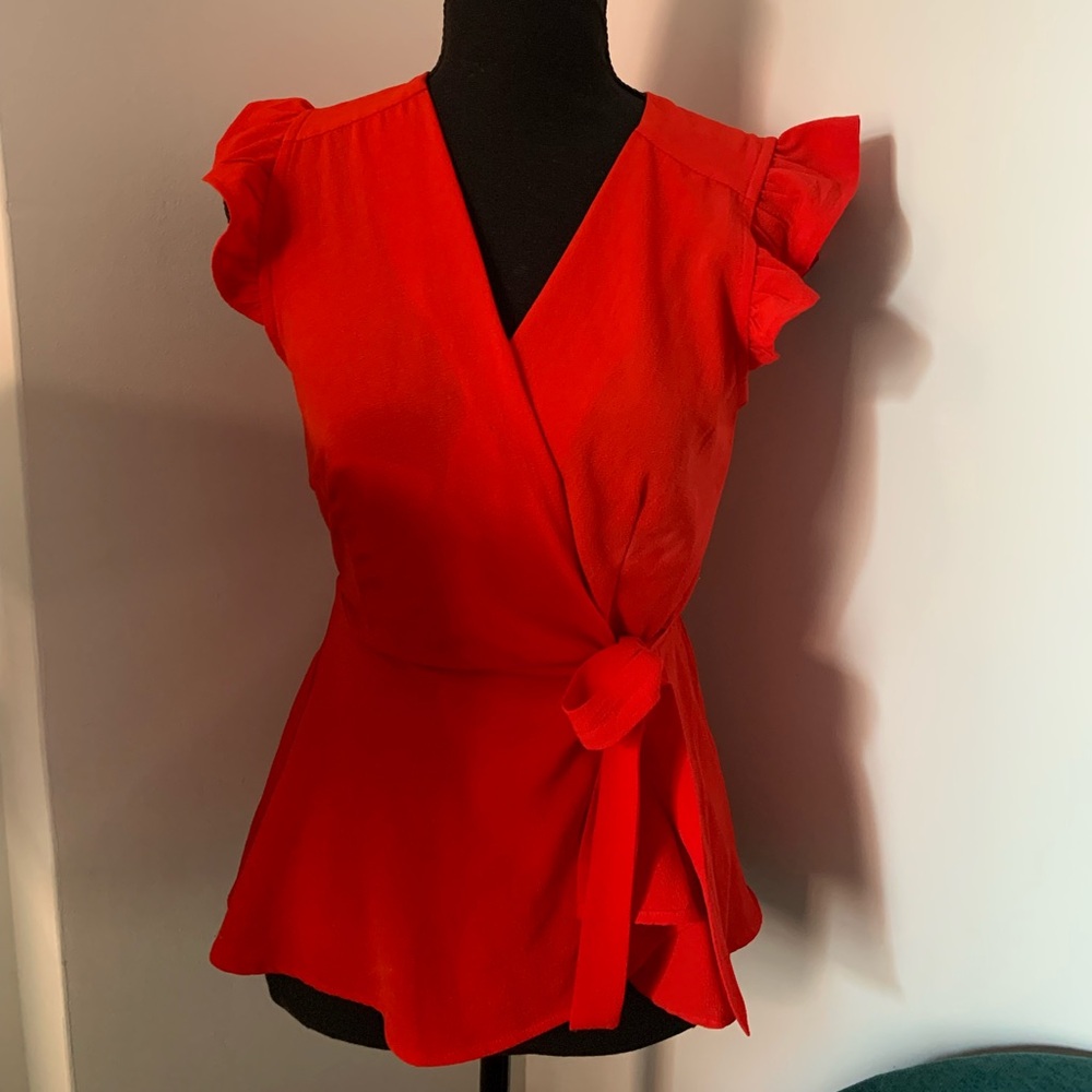 Red Top with tie belt and v neck and ruffle short sleeves